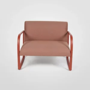 A chair with a wooden frame and a pink fabric.