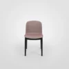 A pink chair with black legs on a white background.